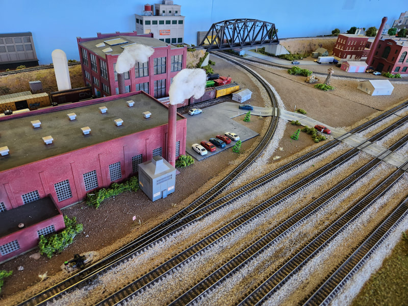 Entering the layout, yard lead under the bridge.